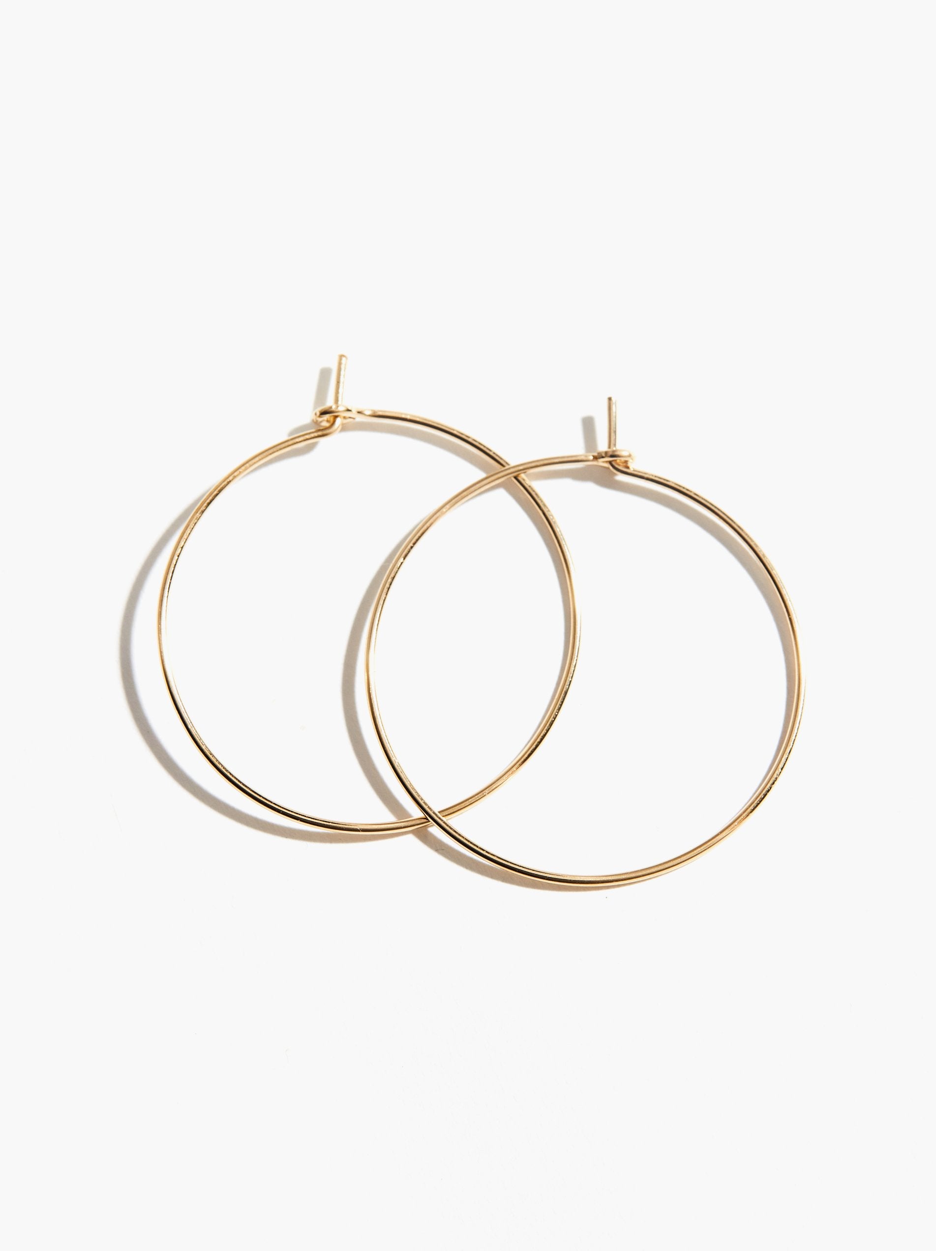 Large Gold Circle Earrings - simple thin hoop on latching kidney